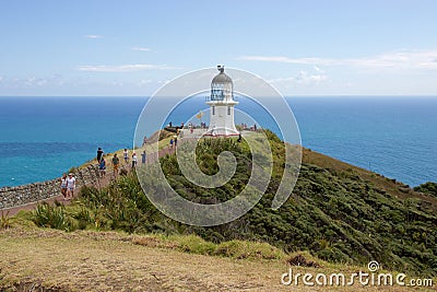 Tourists walk to lighthouse at Cape Reinga, Northland, New Zealand Editorial Stock Photo
