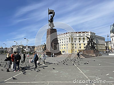 Vladivostok, Russia, October, 08, 2023. Tourists walking around the square of Fighters of the Revolution in autumn Editorial Stock Photo