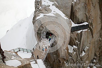 A tourists are walking on bridge over steep, viewing point on Ai Stock Photo