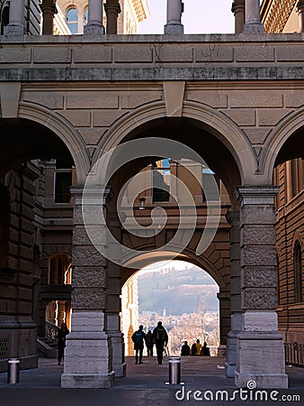 Tourists walking through the gate of the Federal Palace in Bern, Switzerland Editorial Stock Photo