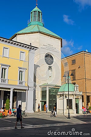 Tourists walking near the ancient Paolotti Church in Rimini, Italy Editorial Stock Photo