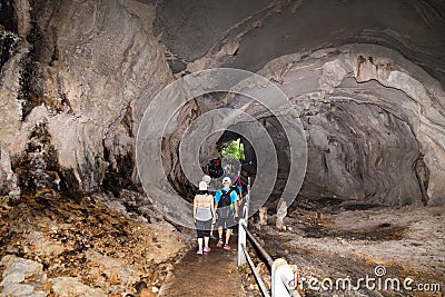 Tourists walking within path inside Wind Cave, Mulu National Par Editorial Stock Photo