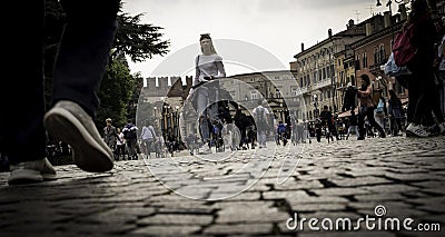 Tourists walking the streets in Verona Editorial Stock Photo