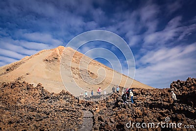 Tourists walking towards Pico del Teide volcano Editorial Stock Photo