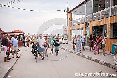 Tourists walking in Vama Veche Editorial Stock Photo