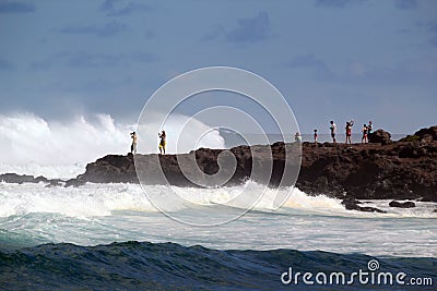 Tourists watching dangerous winter ocean waves Editorial Stock Photo