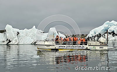 Tourist at Jokulsarlon glacier lagoon in south Iceland Editorial Stock Photo