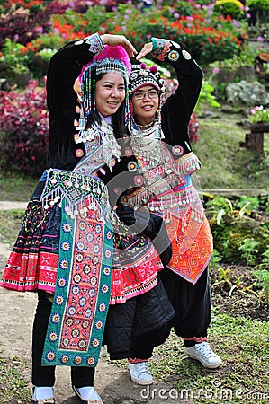 The tourists wear tribal costumes of Miao Tribal Stock Photo
