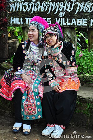 The tourists wear tribal costumes of Miao Tribal Stock Photo