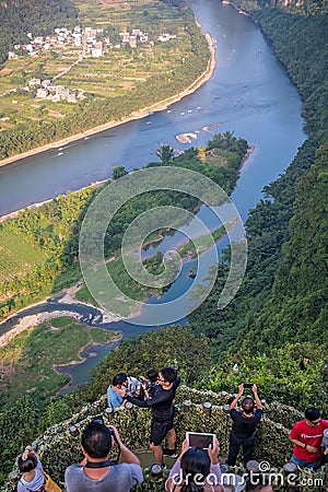 Tourists on the Xianggong Hill viewpoint Editorial Stock Photo