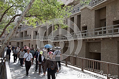 Tours in the Mogao cave Editorial Stock Photo