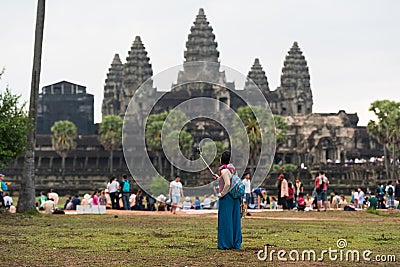 Toursit- Girl, Angkor Wat in Cambodia Editorial Stock Photo