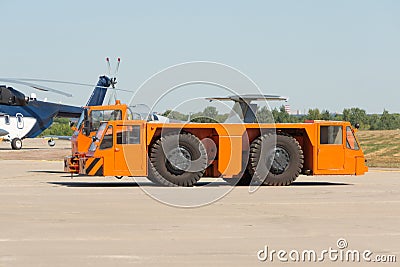 Tow bar,push back truck for airplanes at the airfield Stock Photo