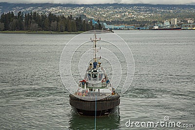 Tow boat ocean water surface background marine port Editorial Stock Photo