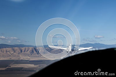 Tow Plane Viewed From Glider Cockpit With Landscape Stock Photo