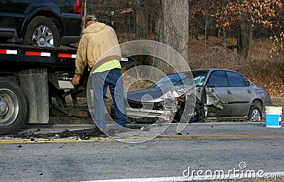 Tow Truck Driver Wrecked Auto Stock Photo