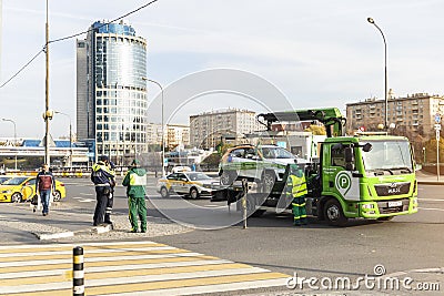 tow truck takes the car police issue parking fine Moscow Editorial Stock Photo