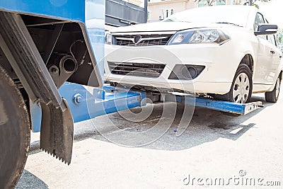 Tow truck towing a broken down car Stock Photo