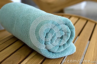 Towel braided in a tubule on chair Stock Photo