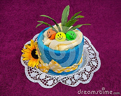 Towel funny cake gift . Stock Photo