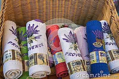 Towels for sale at a tourist shop in Avignon Editorial Stock Photo