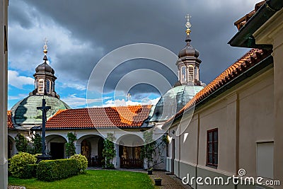 Tower, ambit and garden in Klokoty Stock Photo