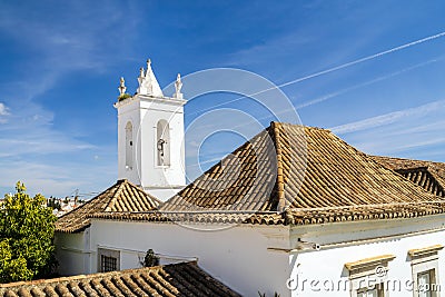 Tower with bell of Misericordia Church in Tavira, Algarve, Portugal Stock Photo