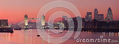 Tower Bridge and city of London with deep red suns Stock Photo