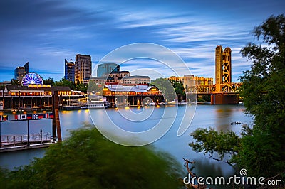 Tower Bridge and Sacramento River in Sacramento, California, captured at night Stock Photo