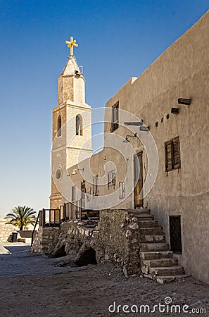 Tower and building in ancient cloister. Stock Photo