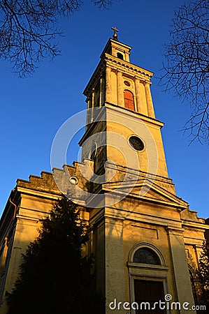 Tower of classicistic German evengelic church in Modra with typical square shape and columns. Stock Photo