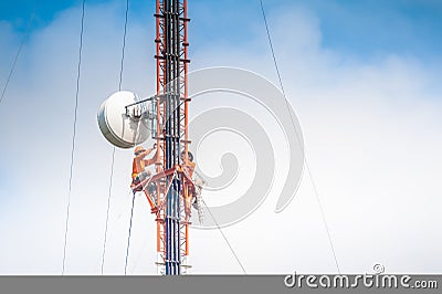 Tower climber and working Stock Photo