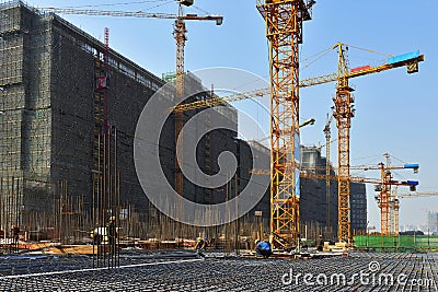 Tower crane in construction site,In the construction of large buildings Stock Photo