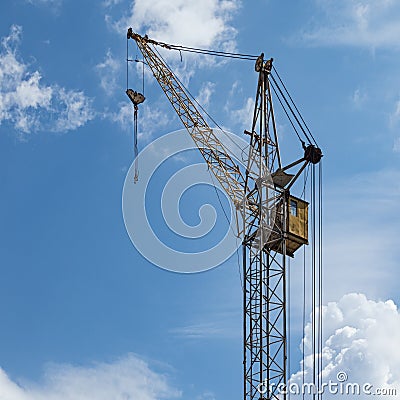 Tower Crane Top, Load Boom, Control Cab, Pulleys, Cables, Hook Suspension and Hook Slings Stock Photo