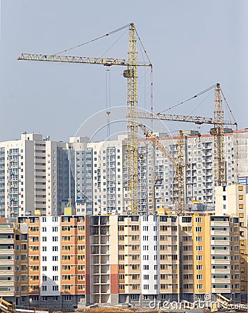 Tower cranes construction city buildings Stock Photo