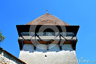 Tower of the fortified medieval saxon church in Cincsor-Kleinschenk, Sibiu county. Stock Photo