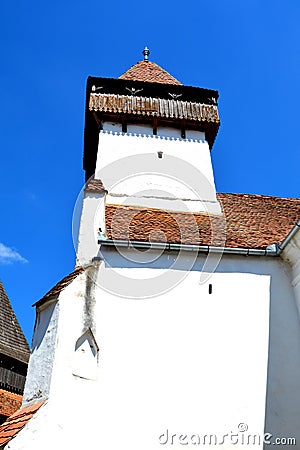 Tower of the fortified saxon medieval church Homorod, Transylvania Editorial Stock Photo