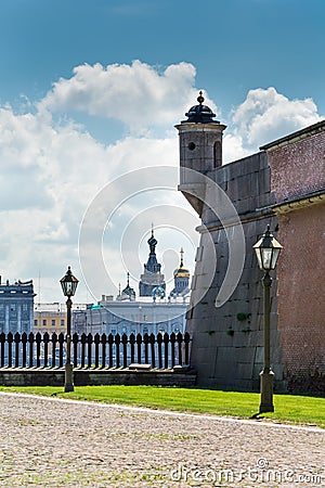 The tower of the fortress and town in the background - Inside in Peter and Paul fortress in St. Petersburg, Russia Editorial Stock Photo