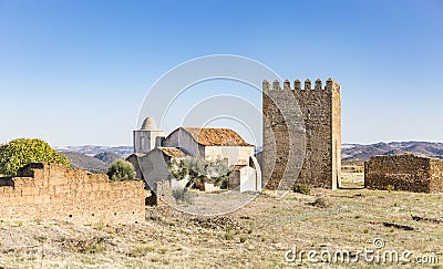 Tower of Homage and the church inside the Castle of Noudar, Barrancos, Portugal Stock Photo