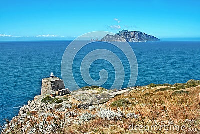 The tower and lighthouse of Punta Campanella at Sorrento Stock Photo