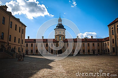 Nesvizh Castle Courtyard with Picturesque Blue Sky Background at sunny summer day. Belarus Editorial Stock Photo