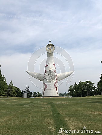 Tower of the sun is a famous landmark in Expo`70 commemorative park at Osaka, Japan Editorial Stock Photo