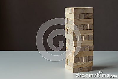 Tower from wooden blocks. Jenga board game Stock Photo