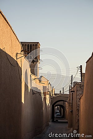 Typical Windtower made of clay taken in the streets of Yazd, iran. Stock Photo