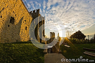 Towers and city walls of Piran at sunset, coastal town in Istria Stock Photo