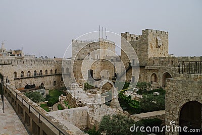 Towers and walls of Jerusalem citadel and Tower of David in san Stock Photo