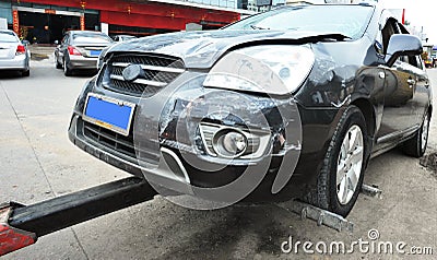 Towing a damaged car Stock Photo