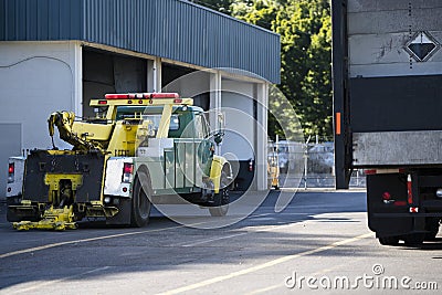 Towing truck for towing broken big rigs semi truck Stock Photo