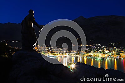 Town Makarska and monument in Croatia Stock Photo