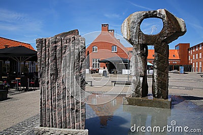 Town square in the city center with a fountain & statue in Skagen, Denmark Editorial Stock Photo